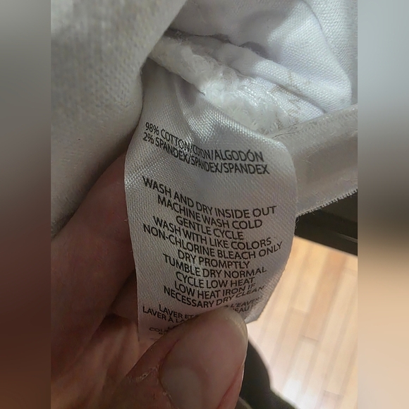 Calvin Klein White Distressed Denim Shorts - Picture 9 of 12